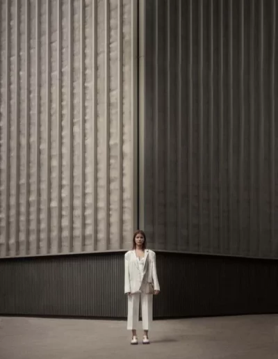 Fashion model wearing a luxury leather bag - photographed by London fashion photographer for brand campaign